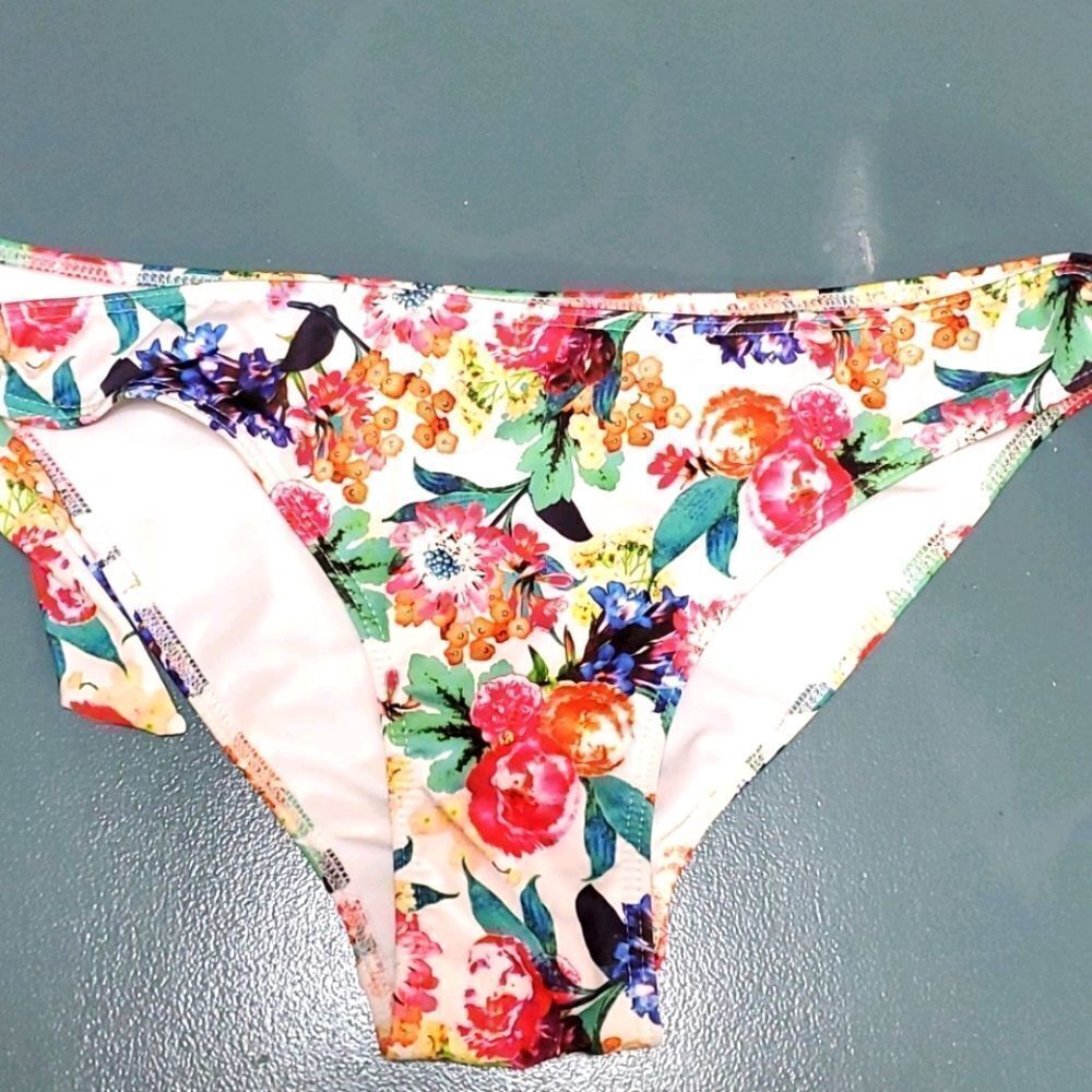 H&M bikini bottoms, size 6. Floral. Good used condition